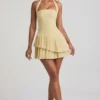 Rosaria Asymmetrisches, mehrlagiges Neckholder-Minikleid in Pastellgelb