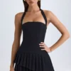 Rosaria asymmetrisches, mehrlagiges Neckholder-Minikleid in Schwarz