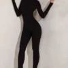 Rumer Jumpsuit mit hohem Kragen und offenem Rücken in Schwarz Rumer Jumpsuit mit hohem Kragen und offenem Rücken in Schwarz