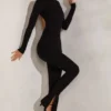 Rumer Jumpsuit mit hohem Kragen und offenem Rücken in Schwarz Rumer Jumpsuit mit hohem Kragen und offenem Rücken in Schwarz