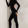Rumer Jumpsuit mit hohem Kragen und offenem Rücken in Schwarz Rumer Jumpsuit mit hohem Kragen und offenem Rücken in Schwarz