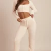 Safia Flauschige Strickhose mit weitem Bein in Elfenbein Safia Flauschige Strickhose mit weitem Bein in Elfenbein