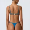 Sanibel Bikini-Oberteil mit Kettenverzierung und Cut-outs in Ozeanblau Sanibel Bikini-Oberteil mit Kettenverzierung und Cut-outs in Ozeanblau