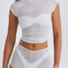 Santana Transparentes, gerafftes, kurzes T-Shirt in Weiß Santana Transparentes, gerafftes, kurzes T-Shirt in Weiß