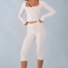 Selene Strick-Caprihose mit mittlerer Leibhöhe in Elfenbein Selene Strick-Caprihose mit mittlerer Leibhöhe in Elfenbein