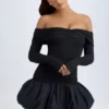 Serra Modal-Minikleid mit schulterfreiem Ausschnitt und Bubble-Saum in Schwarz Serra Modal-Minikleid mit schulterfreiem Ausschnitt und Bubble-Saum in Schwarz