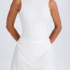 Shirin Minikleid mit drapiertem Rückenausschnitt in Weiß Shirin Minikleid mit drapiertem Rückenausschnitt in Weiß