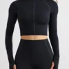 Soft Active Crop-Top mit Rollkragen in Schwarz Soft Active Crop-Top mit Rollkragen in Schwarz