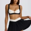 Soft Active Crossover-Minirock mit Falten in Schwarz