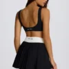Soft Active Crossover-Minirock mit Falten in Schwarz