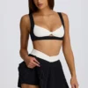 Soft Active Crossover-Minirock mit Falten in Schwarz