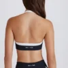 Soft Active Sport-BH mit gedrehter Vorderseite und Neckholder in Schwarz Soft Active Sport-BH mit gedrehter Vorderseite und Neckholder in Schwarz