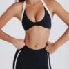 Soft Active Sport-BH mit gedrehter Vorderseite und Neckholder in Schwarz Soft Active Sport-BH mit gedrehter Vorderseite und Neckholder in Schwarz