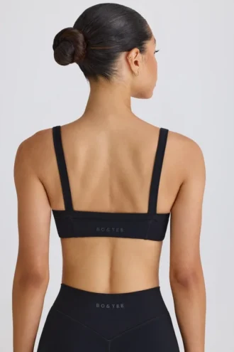 Soft Active Sport-BH mit Kontrastpaspel in Schwarz