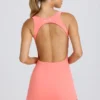 Soft Active Tennis-Kleid mit offenem Rücken in Koralle Soft Active Tennis-Kleid mit offenem Rücken in Koralle