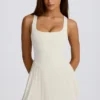 Soft Active Tennis-Kleid mit Plissee und offenem Rücken in Ivory Soft Active Tennis-Kleid mit Plissee und offenem Rücken in Ivory