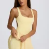 Soft Active Tennis-Kleid mit Plissee und offenem Rücken in Lemon Soft Active Tennis-Kleid mit Plissee und offenem Rücken in Lemon