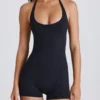 Soft Active Unitard mit Neckholder in Schwarz Soft Active Unitard mit Neckholder in Schwarz