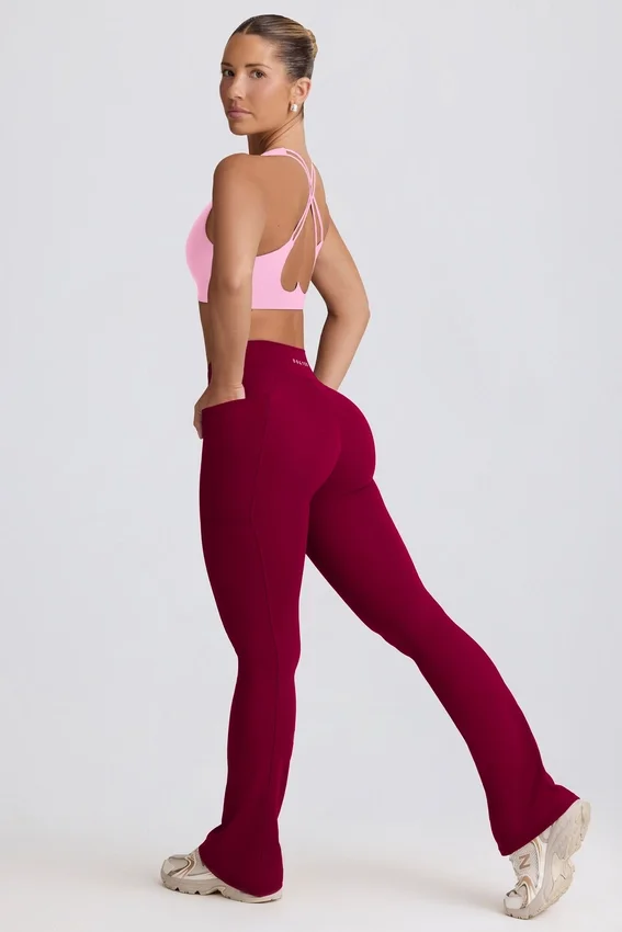 Soft Active V-Taillen-Leggings mit Taschen und ausgestelltem Bein in Burgunderrot Soft Active V-Taillen-Leggings mit Taschen und ausgestelltem Bein in Burgunderrot