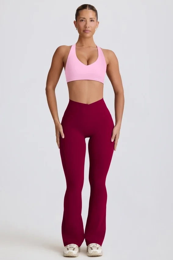 Soft Active V-Taillen-Leggings mit Taschen und ausgestelltem Bein in Burgunderrot Soft Active V-Taillen-Leggings mit Taschen und ausgestelltem Bein in Burgunderrot