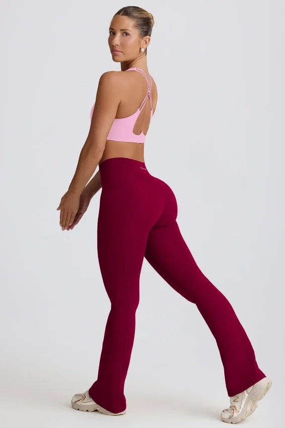 Soft Active V-Taillen-Leggings mit Taschen und ausgestelltem Bein in Burgunderrot Soft Active V-Taillen-Leggings mit Taschen und ausgestelltem Bein in Burgunderrot