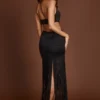 Solferina Maxikleid mit Fransen und tiefem Ausschnitt in Schwarz Solferina Maxikleid mit Fransen und tiefem Ausschnitt in Schwarz
