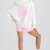 Strukturierter Baumwolljersey-Hoodie mit Grafikprint in Weiß Strukturierter Baumwolljersey-Hoodie mit Grafikprint in Weiß