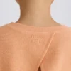 Strukturierter Baumwolljersey-Sweater mit offenem Rücken in Pfirsich Strukturierter Baumwolljersey-Sweater mit offenem Rücken in Pfirsich