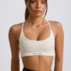 Super Sculpt nahtloser rückenfreier Sport-BH in Weiß Super Sculpt nahtloser rückenfreier Sport-BH in Weiß