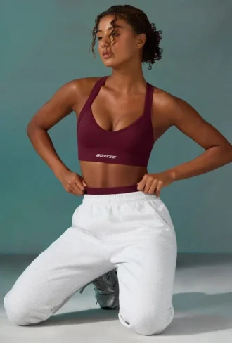Super Sculpt nahtloser Sport-BH mit gekreuztem Rücken in Pflaume