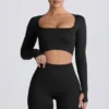 Super Sculpt nahtloses langärmeliges Crop-Top in Schwarz Super Sculpt nahtloses langärmeliges Crop-Top in Schwarz