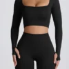 Super Sculpt nahtloses langärmeliges Crop-Top in Schwarz Super Sculpt nahtloses langärmeliges Crop-Top in Schwarz