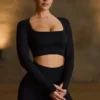 Super Sculpt nahtloses langärmeliges Crop-Top in Schwarz Super Sculpt nahtloses langärmeliges Crop-Top in Schwarz