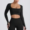 Super Sculpt nahtloses langärmeliges Crop-Top in Schwarz Super Sculpt nahtloses langärmeliges Crop-Top in Schwarz