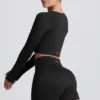 Super Sculpt nahtloses langärmeliges Crop-Top in Schwarz Super Sculpt nahtloses langärmeliges Crop-Top in Schwarz