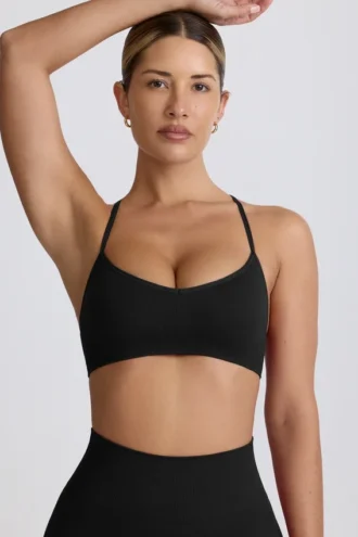 Super Sculpt Seamless Cross-Back Sport-BH in Schwarz