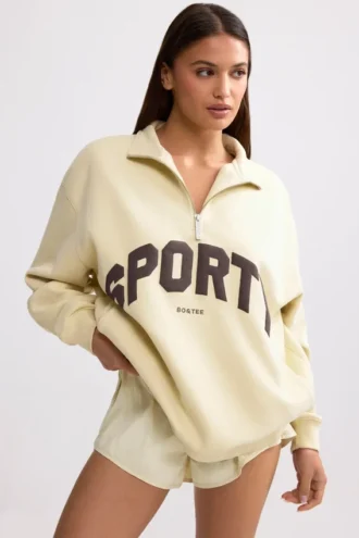 Sweatshirt mit Viertelreißverschluss in Bone