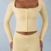 Tahlia Strick-Cardigan mit langen Ärmeln in Buttergelb Tahlia Strick-Cardigan mit langen Ärmeln in Buttergelb