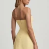 Talina Minikleid mit Herzausschnitt, trägerlos und strukturiert in Pastellgelb Talina Minikleid mit Herzausschnitt, trägerlos und strukturiert in Pastellgelb