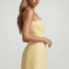 Talina Minikleid mit Herzausschnitt, trägerlos und strukturiert in Pastellgelb Talina Minikleid mit Herzausschnitt, trägerlos und strukturiert in Pastellgelb