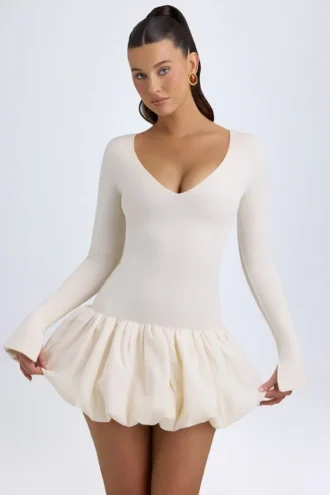 Tallou Modal-Minikleid mit tiefem Taillenbund und Bubble-Saum in Elfenbein