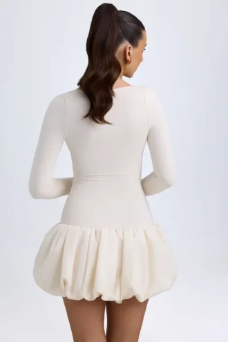 Tallou Modal-Minikleid mit tiefem Taillenbund und Bubble-Saum in Elfenbein