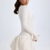 Tallou Modal-Minikleid mit tiefem Taillenbund und Bubble-Saum in Elfenbein Tallou Modal-Minikleid mit tiefem Taillenbund und Bubble-Saum in Elfenbein