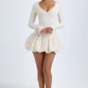 Tallou Modal-Minikleid mit tiefem Taillenbund und Bubble-Saum in Elfenbein Tallou Modal-Minikleid mit tiefem Taillenbund und Bubble-Saum in Elfenbein