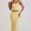 Tamia Rüschen-Trägerloses Spitzen-Oberteil in Pastellgelb Tamia Rüschen-Trägerloses Spitzen-Oberteil in Pastellgelb