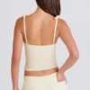 Tanktop aus geripptem Strick mit Bindebändern in Creme Tanktop aus geripptem Strick mit Bindebändern in Creme