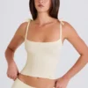 Tanktop aus geripptem Strick mit Bindebändern in Creme Tanktop aus geripptem Strick mit Bindebändern in Creme