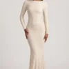 Tarini Maxikleid mit Rüschen und rückenfreiem Ausschnitt aus Spitze in Elfenbein Tarini Maxikleid mit Rüschen und rückenfreiem Ausschnitt aus Spitze in Elfenbein