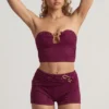 Tarni Bandeau-Crop-Top mit Metallverzierung in Beeren-Lila Tarni Bandeau-Crop-Top mit Metallverzierung in Beeren-Lila