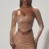Thora Asymmetrisches Crop-Top mit Verzierungen in Mandel Thora Asymmetrisches Crop-Top mit Verzierungen in Mandel